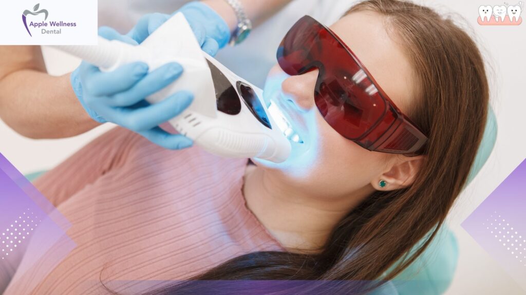 A professional dental office setting with a patient sitting in a reclining chair, surrounded by various teeth whitening tools and devices. In the foreground, a close-up view of the patient's teeth, showcasing the discoloration and the dentist's hand holding a specialized whitening tray. In the middle ground, the dentist in a white coat examining the patient's teeth, their expression focused and attentive. The background features dental equipment, such as overhead lighting, monitors, and other medical devices, creating a clinical yet calming atmosphere. The scene is illuminated by a soft, even lighting, captured with a high-resolution camera lens, emphasizing the technical and professional nature of the teeth whitening procedure. Your Guide to How to Treat Teeth Discoloration - Apple Wellness Dental